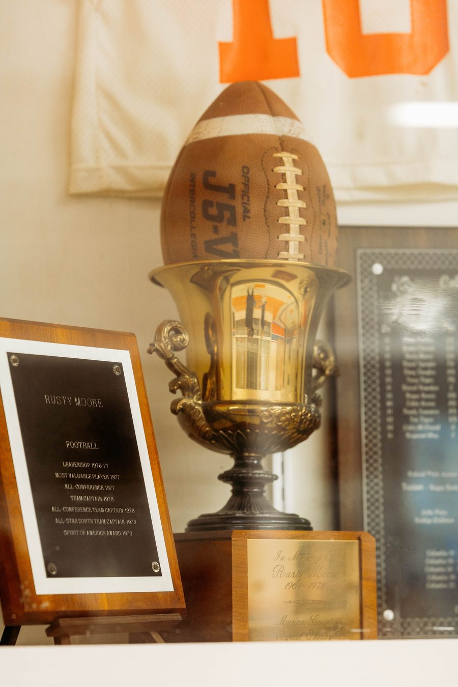 A Columbia Academy football trophy and awards in the trophy case